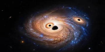 Astrônomos descobrem 3 buracos negros supermassivos em uma única galáxia