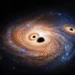 Astrônomos descobrem 3 buracos negros supermassivos em uma única galáxia